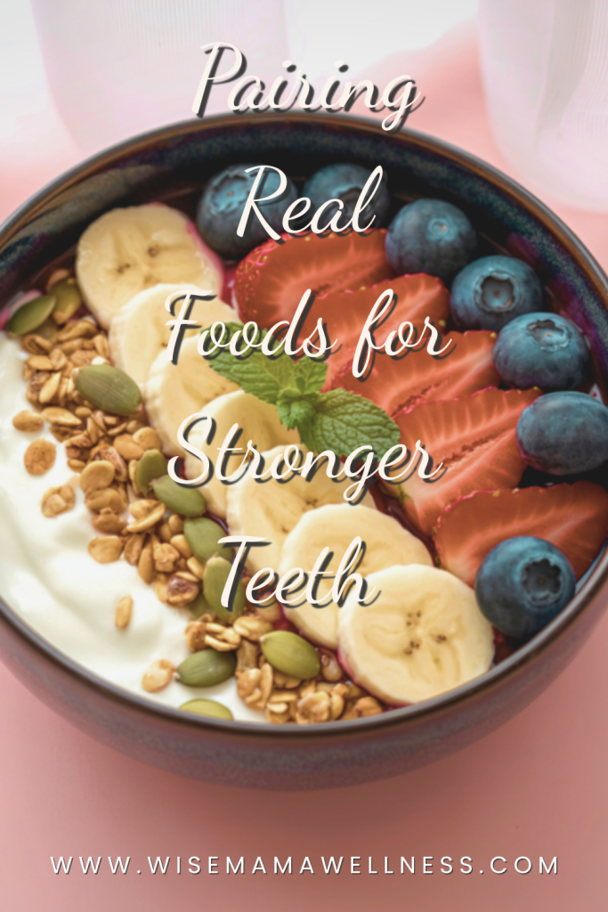 A yogurt bowl topped with bananas, berries, seeds, and granola, highlighting nutrient-dense foods that complement liver for tooth support.