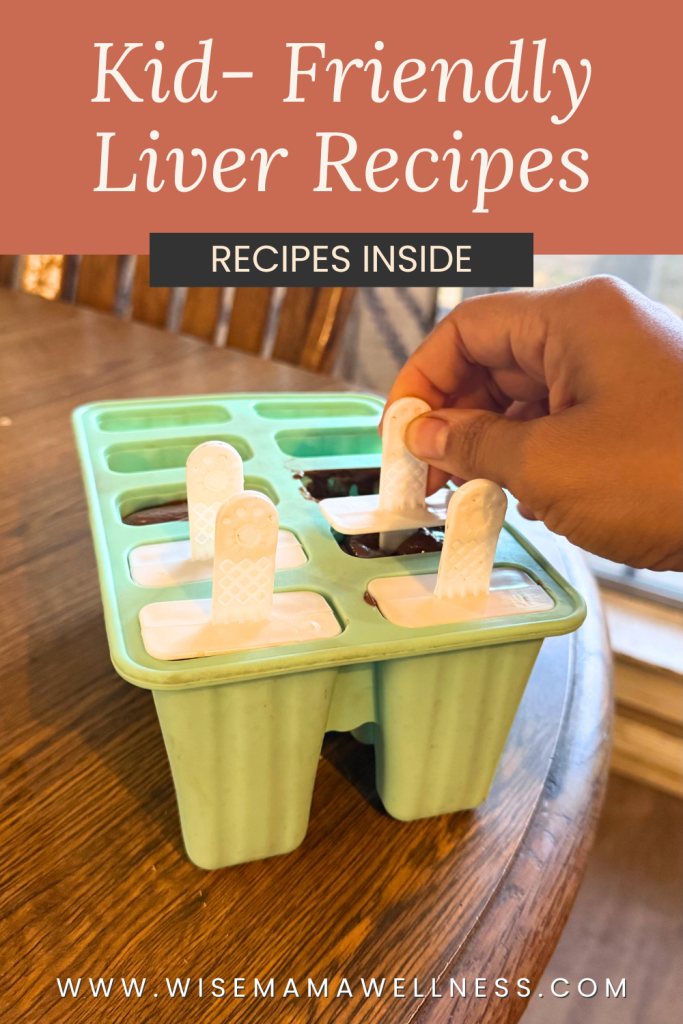 A hand pulling a homemade chocolate popsicle from a silicone mold, showing one of the kid-friendly liver recipes included in the free guide.