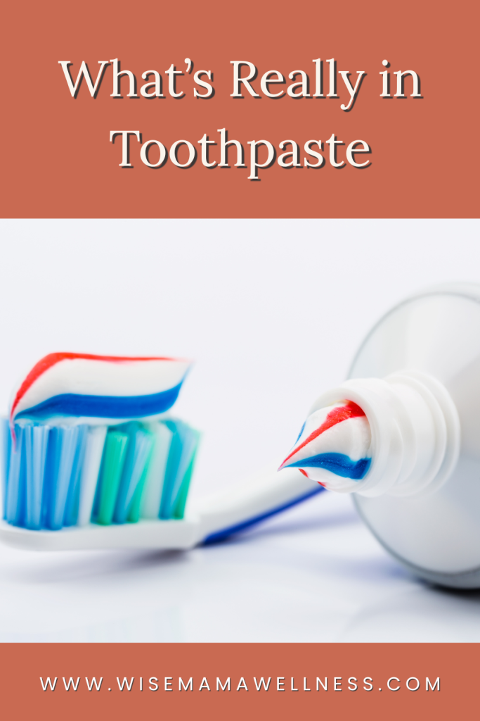 commercial toothpaste ingredients on toothbrush close up